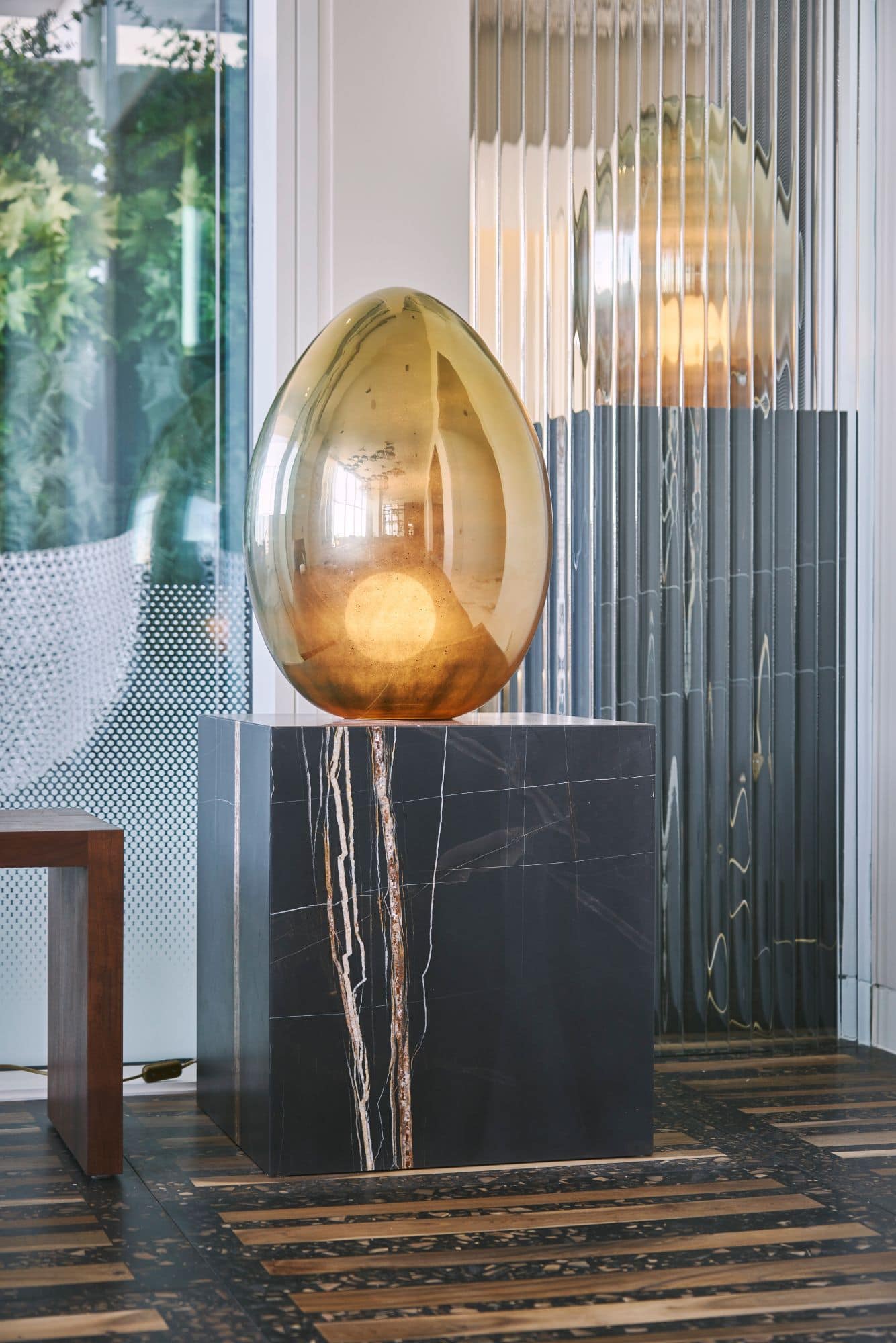 sculptural lighting inside a penthouse of the arabella luxury high rise