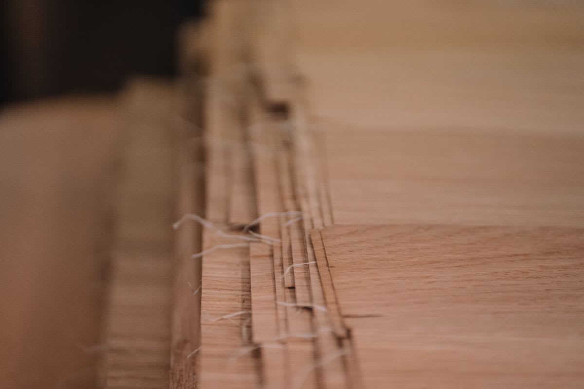eggersmann factory hand stitching of matched wood veneers