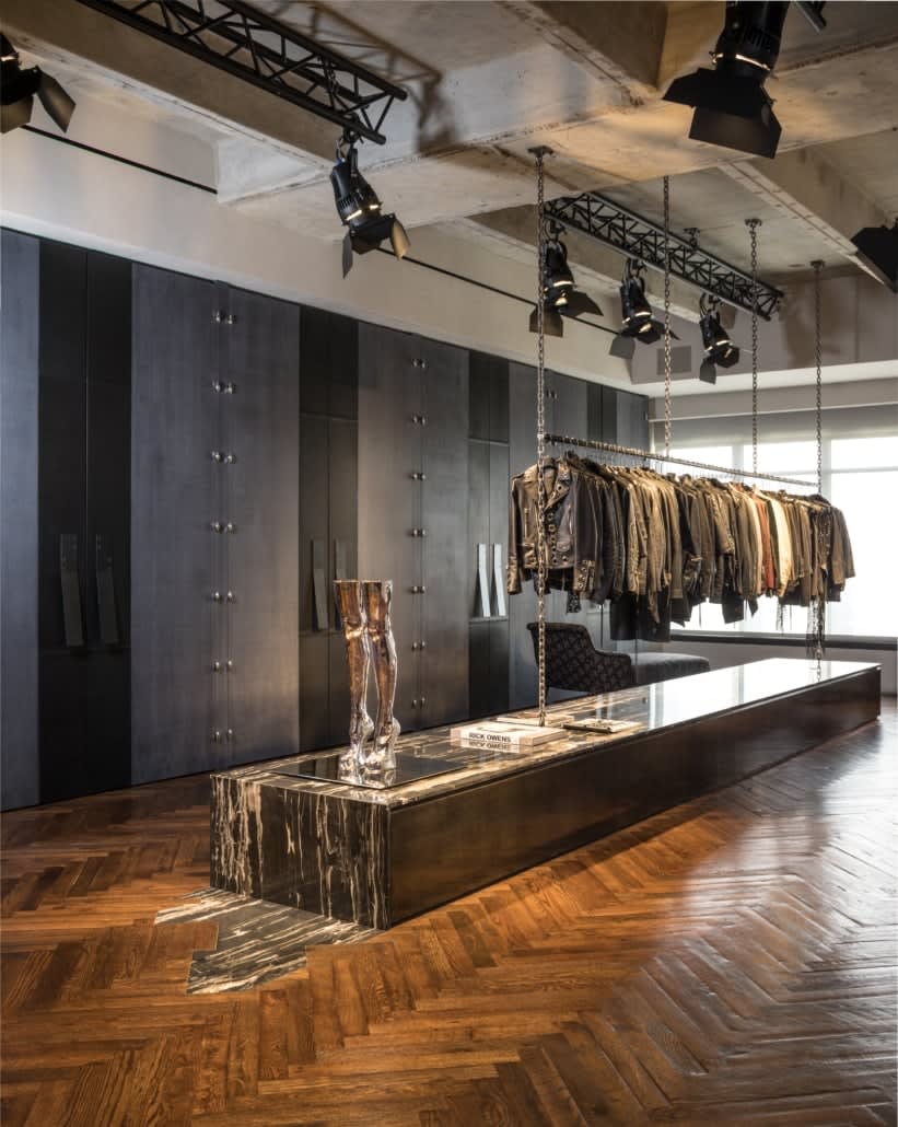 expansive luxury walk-in closet for a man of a full floor renovation of the huntingdon higrise on kirby in houston