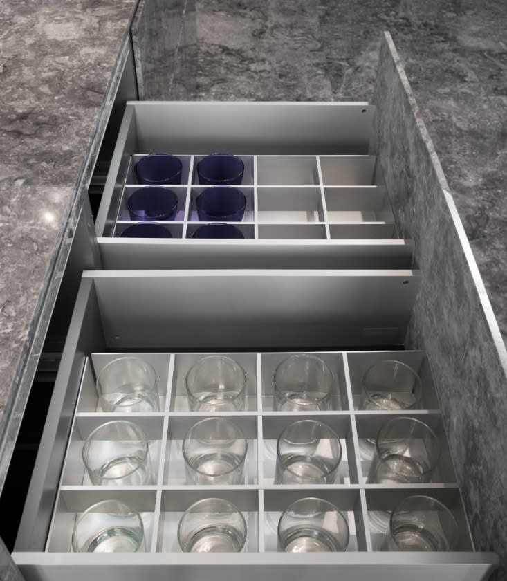 eggersmann glassrware organizer in german cabinetry in huntingdon luxury high-rise on kirby in houston