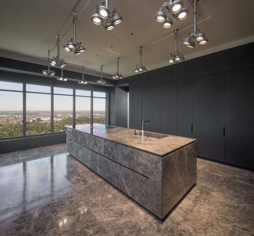 high-end kitchen in huntingdon luxury high-rise on kirby in houston
