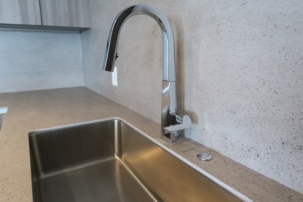 Moen Nio Chrome kitchen faucet used in eggeresmann designed kitchens in luxury high rise condos in The Parklane in Houston