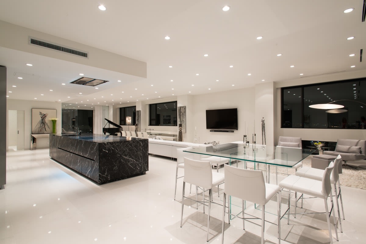 dining area next to elegant stone kitchen
