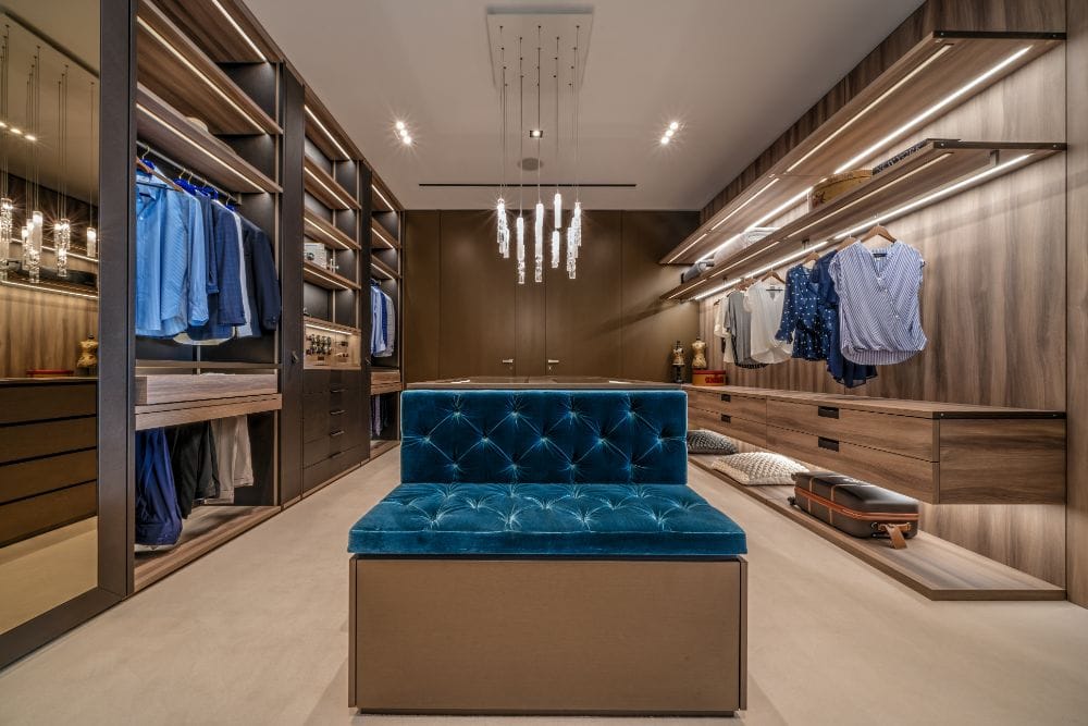 led lighting throughout this luxury walk-in wardobe accentuate the collection of fashion and make getting dressed easier