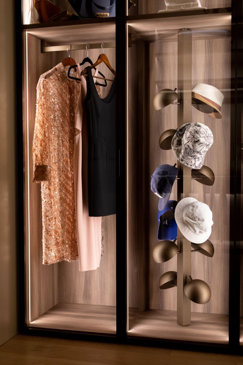 overhead and side lighting using led highlights a collection of haute couture formawear and hat collection