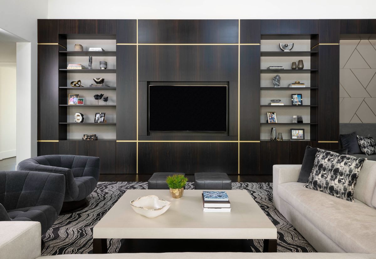 a dallas preston hollow mansion's family room media wall after renovation by eggersmann