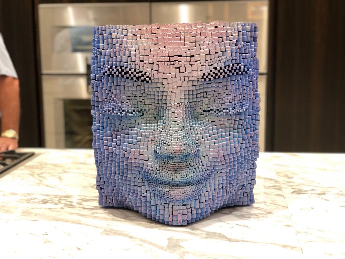 closeup of a face sculpture by gil bruvel that was part of part of patron magazine's curated 2021 art exhibition and dallas design district showroom tour