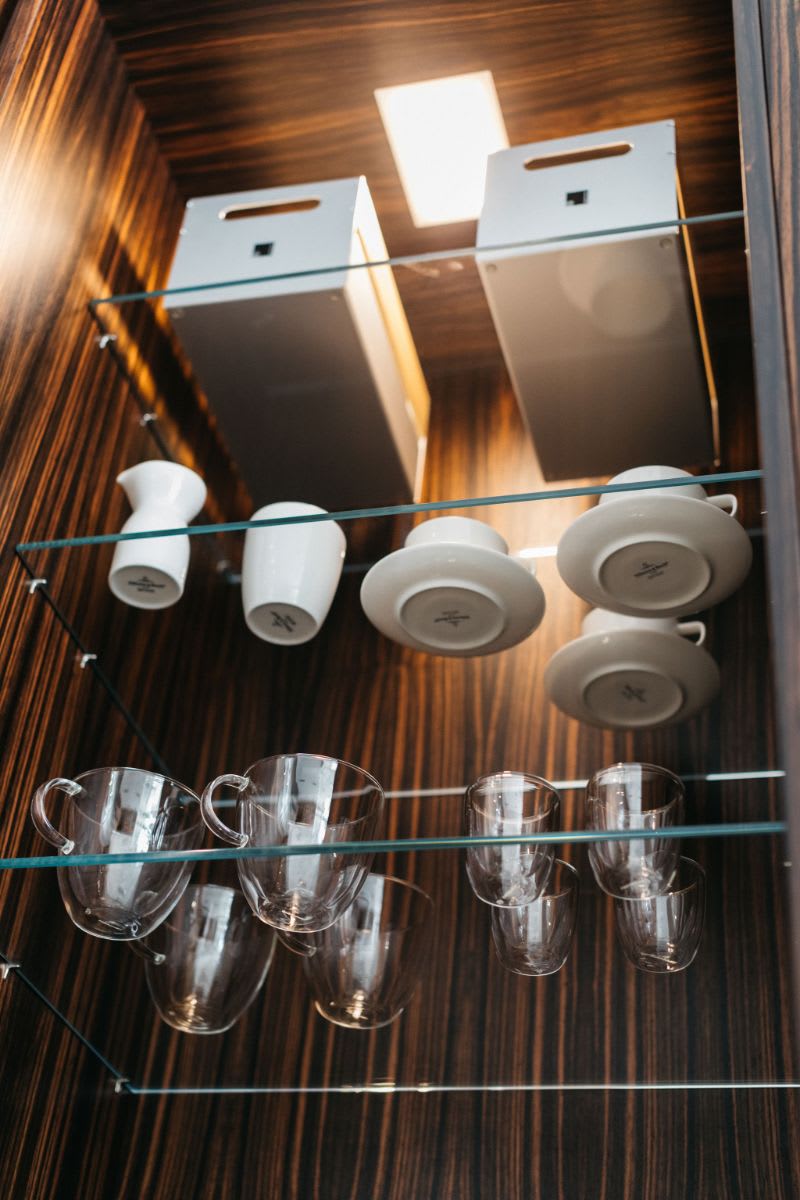 eggersmann boxtec metal & wood organizing caddy box backlit by LED lighting in a custom coffee bar