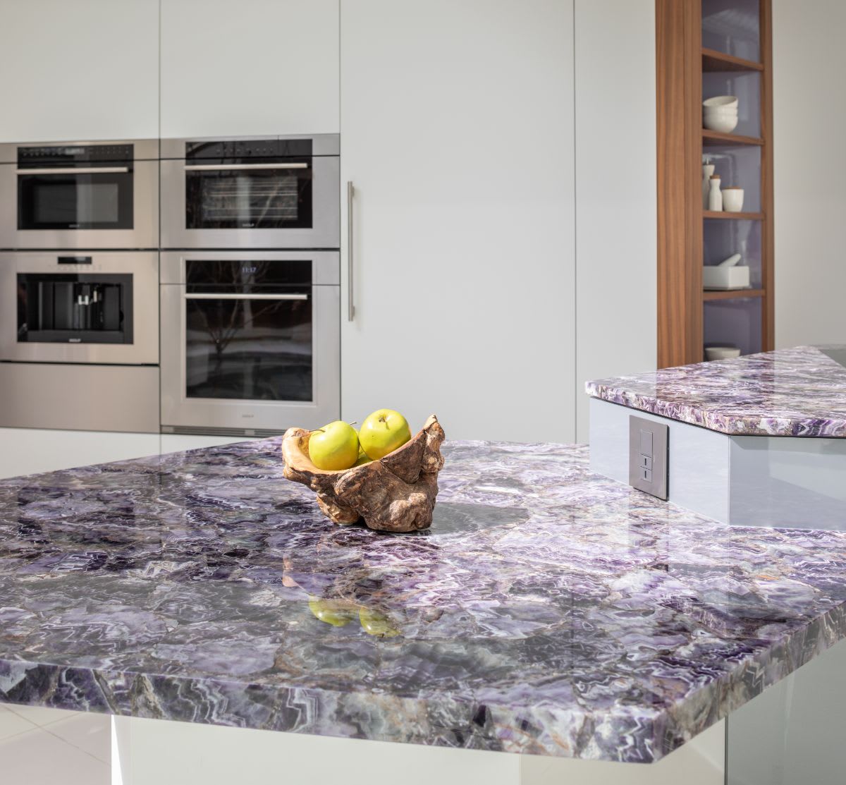 very peri hued stone on kitchen island designed by eggermann