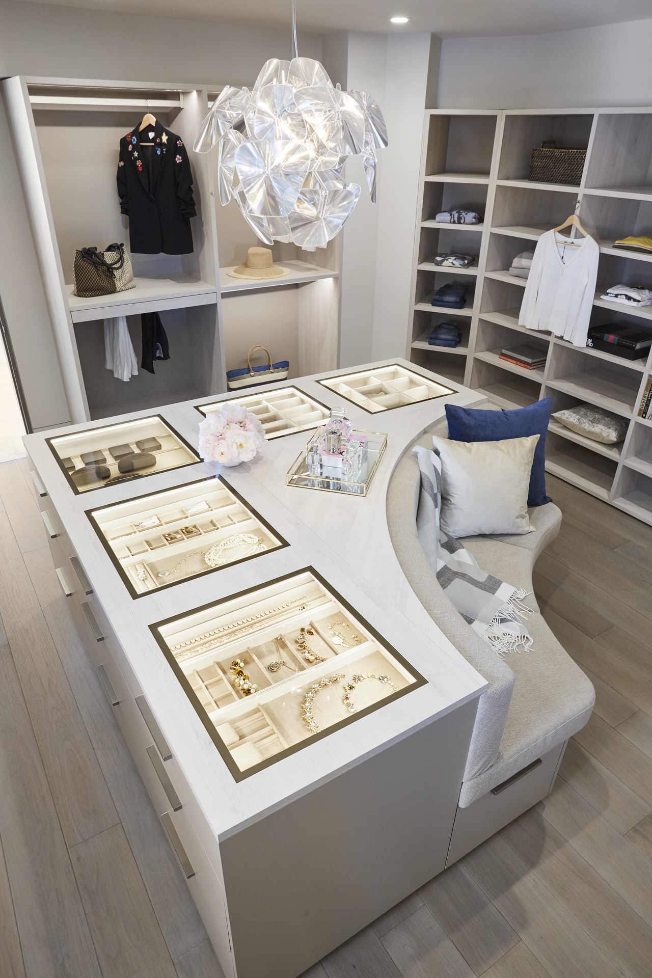 unique luxury closet island with built-in glass top jewelry case