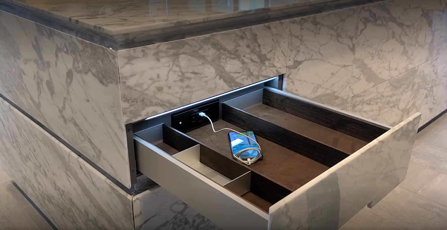 hidden phone charger inside closet island drawer