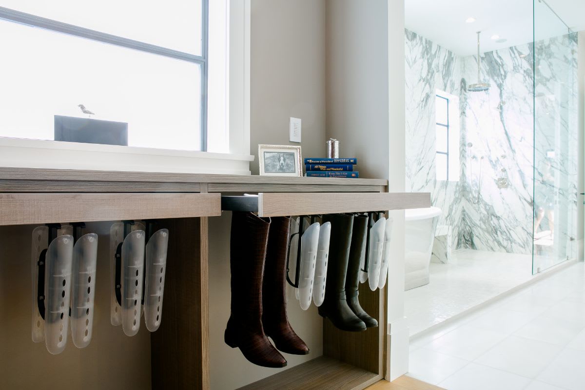 slide-out boot hangers keep your treasured footwear in perfect shape in easy reach