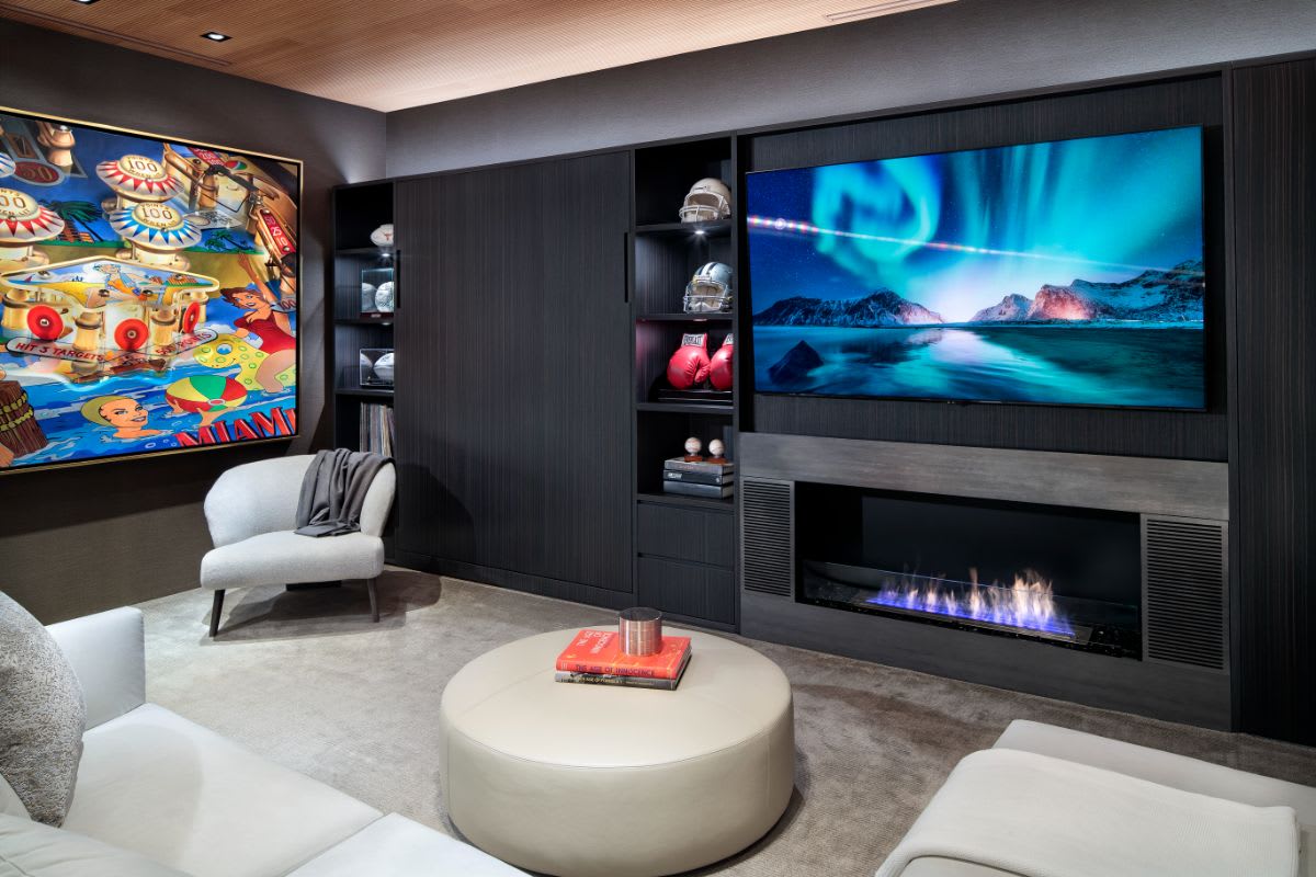 media wall with Murphy bed for guest accommodations designed by eggersman for an austonian high-rise residence in austin texas