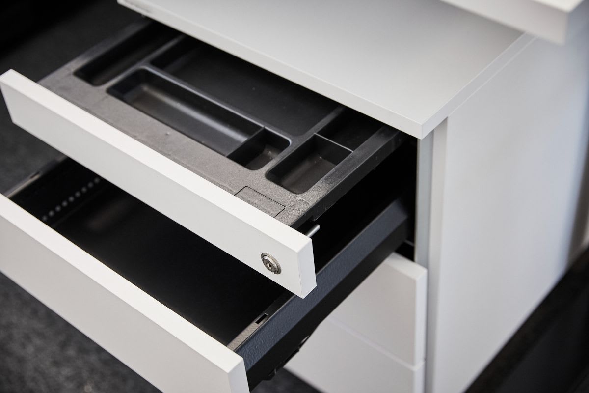 in-drawer organizers inside locking drawers of eggersmann cabinetry