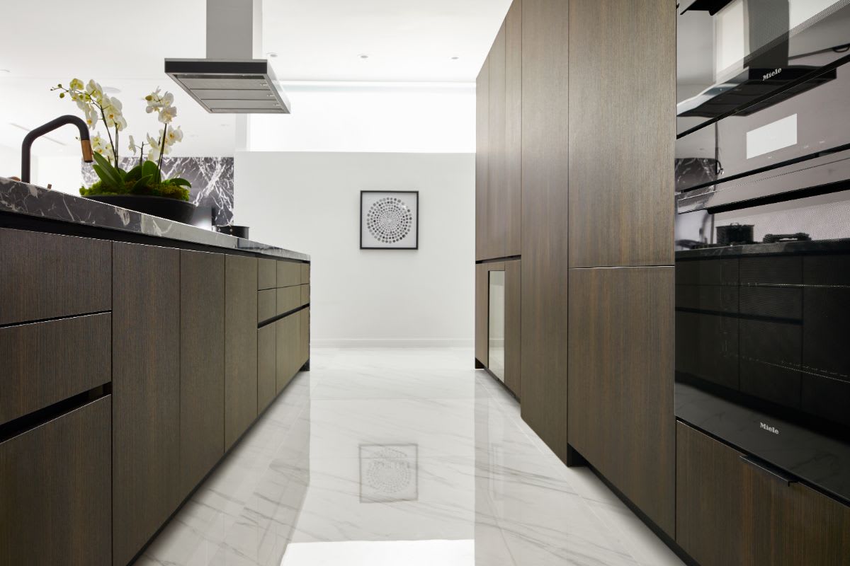 view of the galley of a renovated w dallas high-rise residence kitchen designed by eggersmann