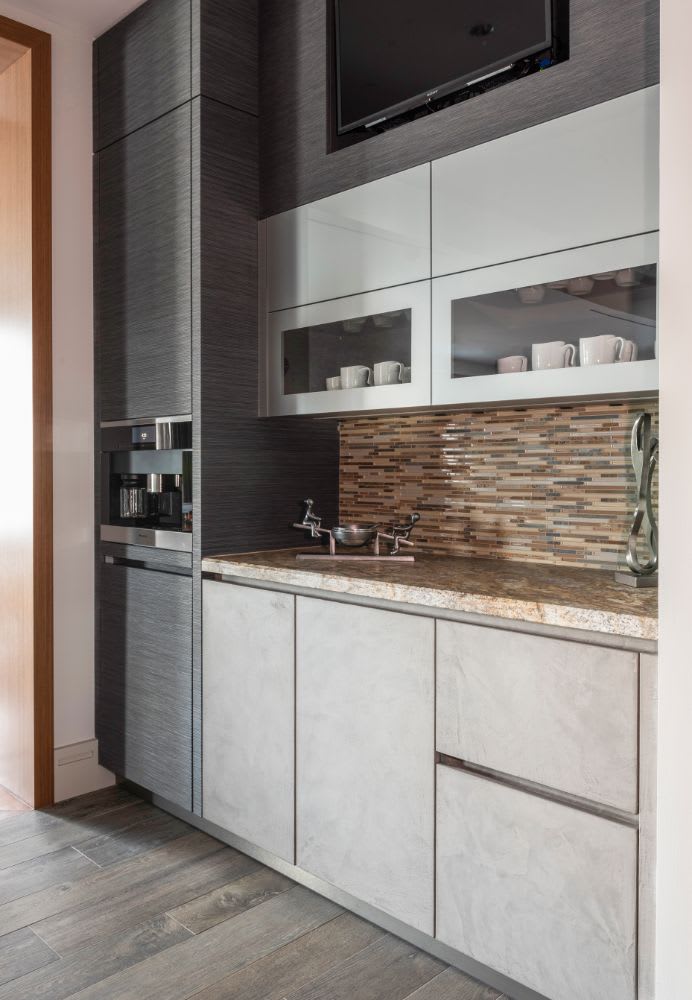 coffee bar with high-end miele coffee maker in a luxury kitchen in the belfiore houston condos