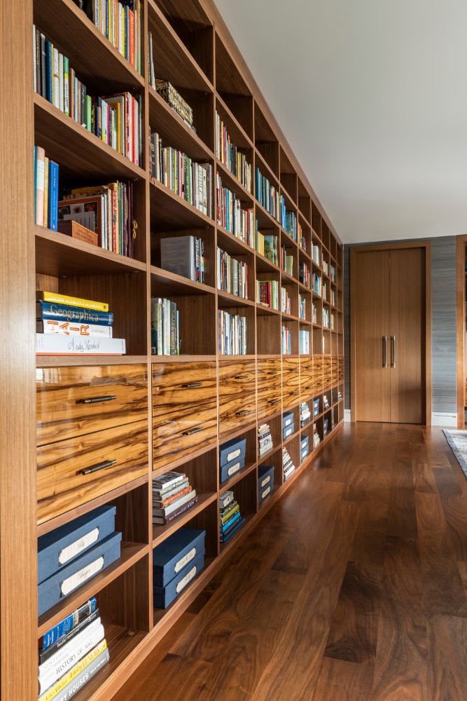 sleek roomy library of the belfiore penthouse designed by eggersmann