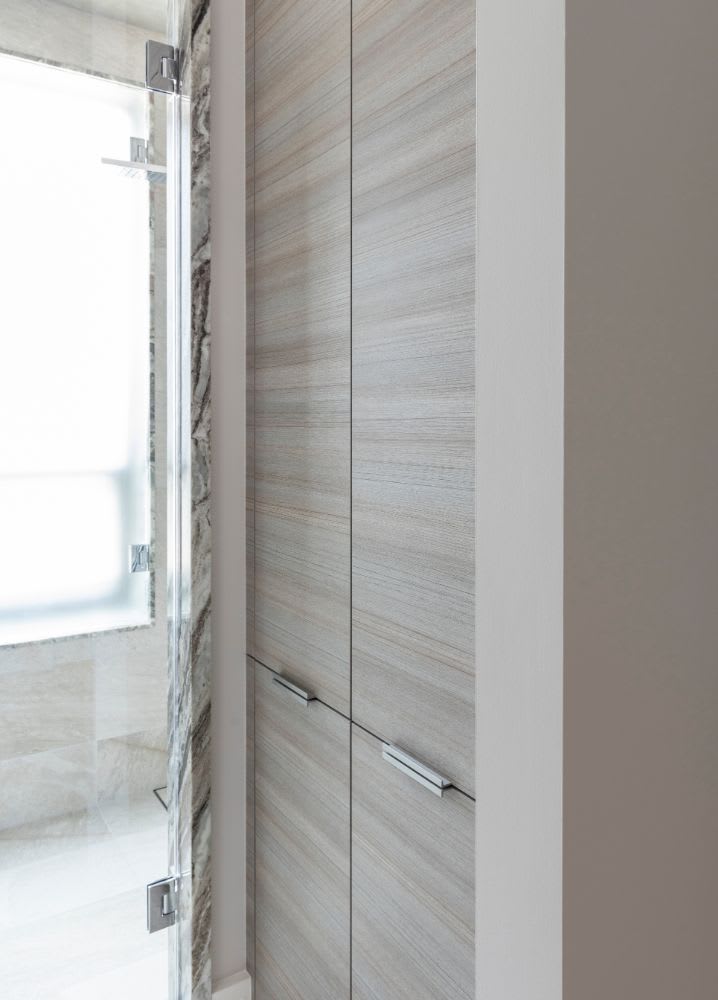 linen closet of luxury master bath