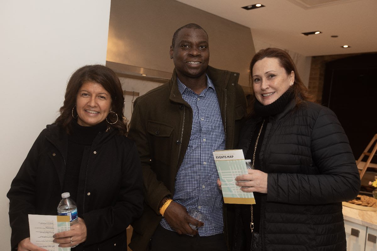 a few attendees at the pup crawl and cat walk fundrising event benefitting PAWS chicago in the eggersmann chicago showroom