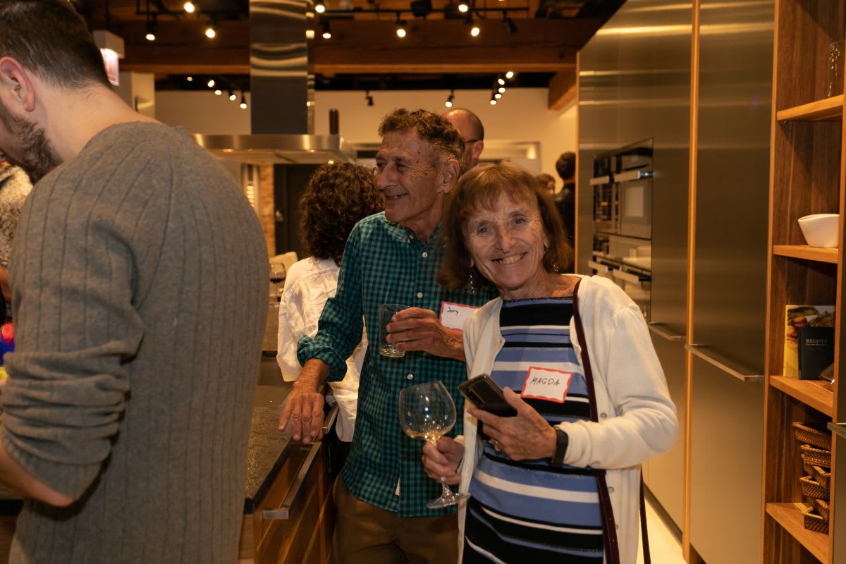 attendees of the chicago lgbtqia spring social enjoying the tour of the eggersmann chicago