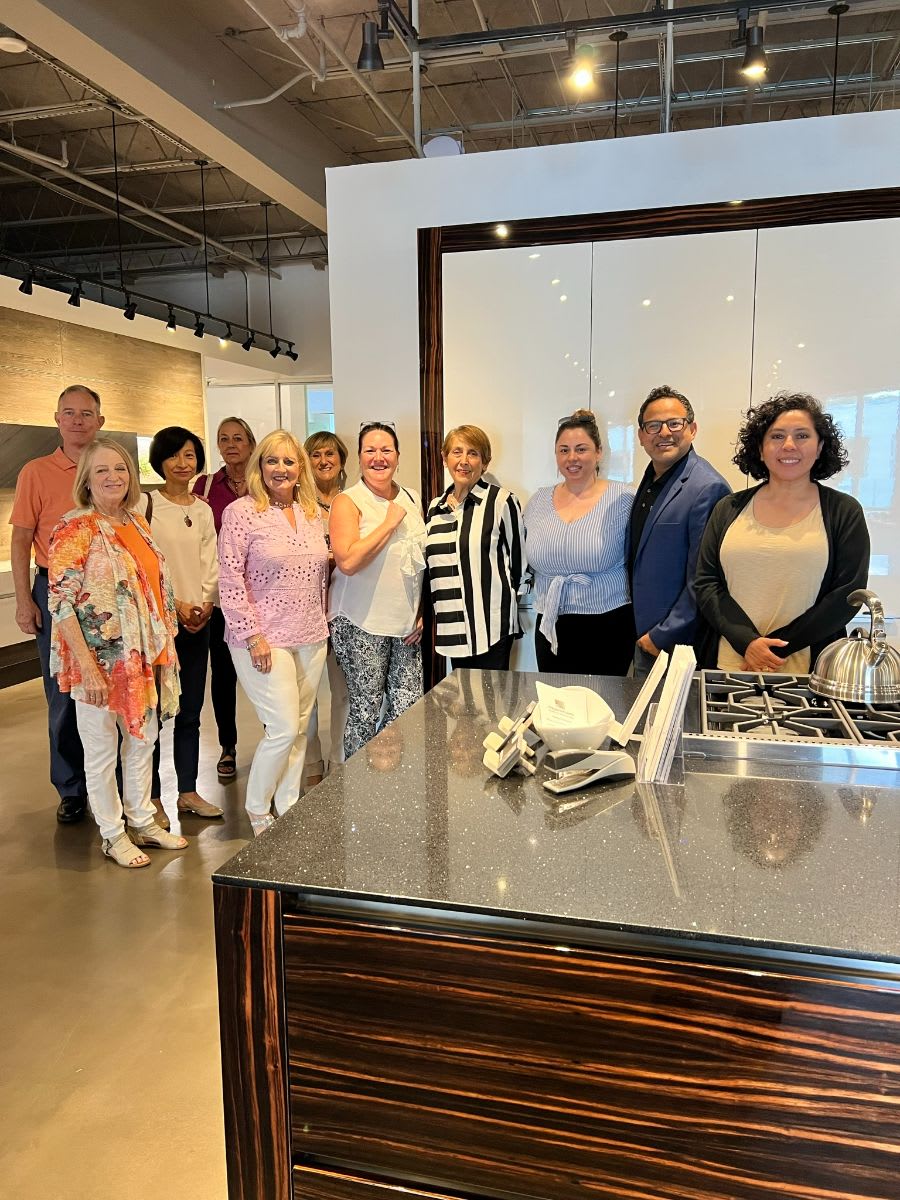 anne breux and other attendees posing for a picture at euro design trends 2022 presentation at eggersmann houston