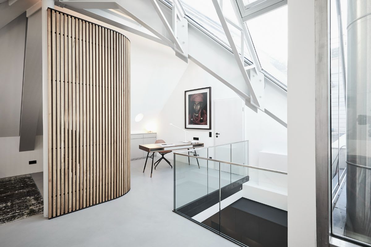 zen-inspired office or study area tucked into a nook at the top of a stair landing