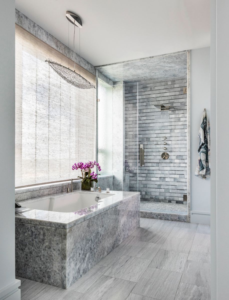 zen-style bath with tone-on-tone palette and natural stone
