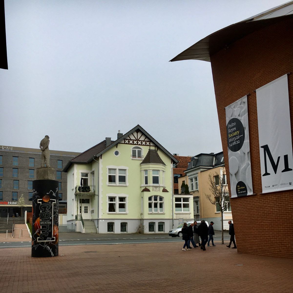 quaint country style homes surround the marta museum in the small town of herford germany