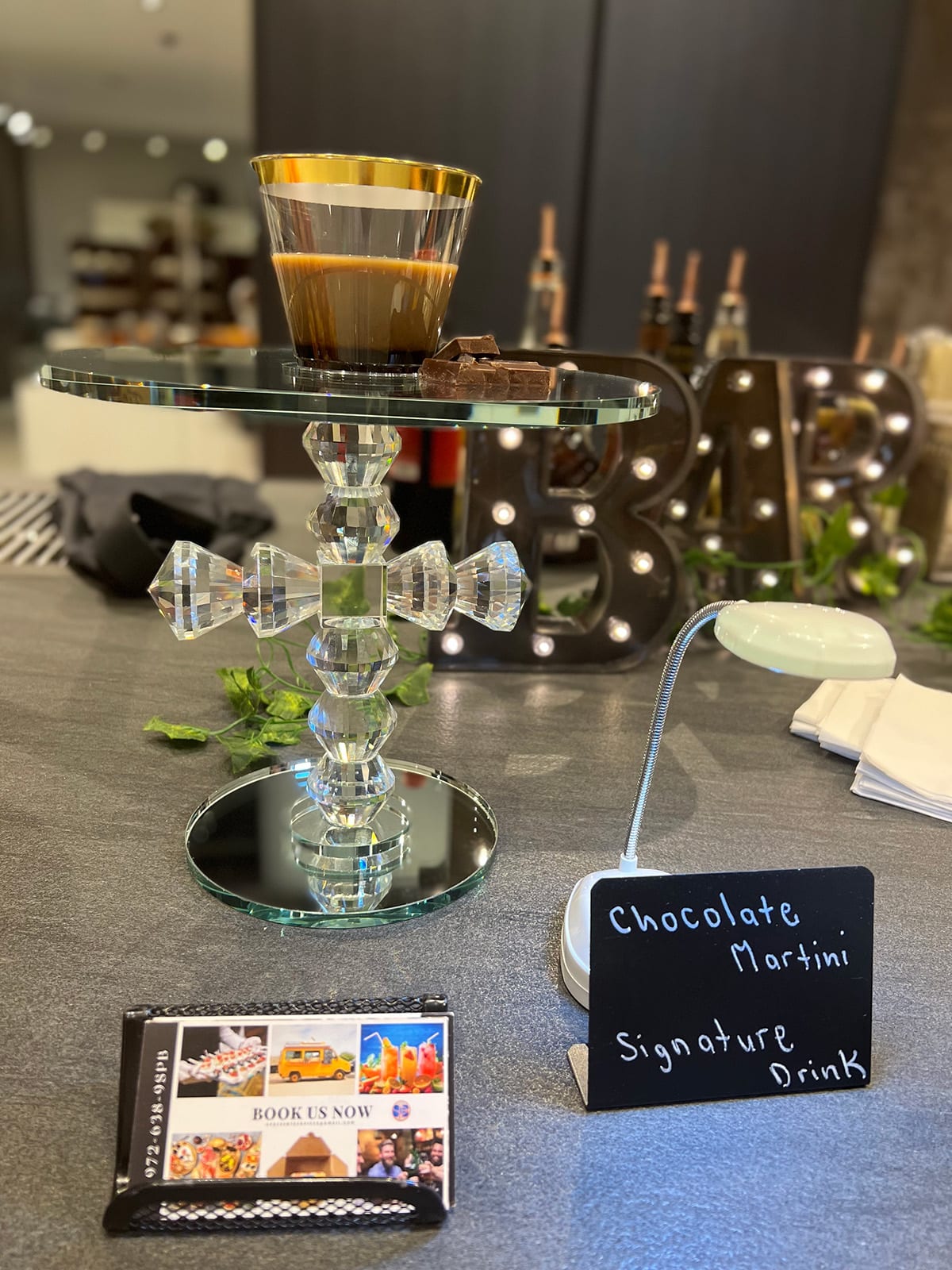 signature cocktail by simply phillip brown event services served at eggersmann dallas during the 2022 curated art walk in the dallas design district