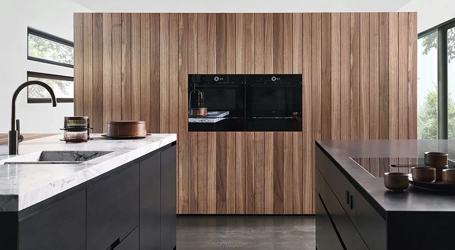 eggersmann black walnut ontario wall cabinetry with black steel island