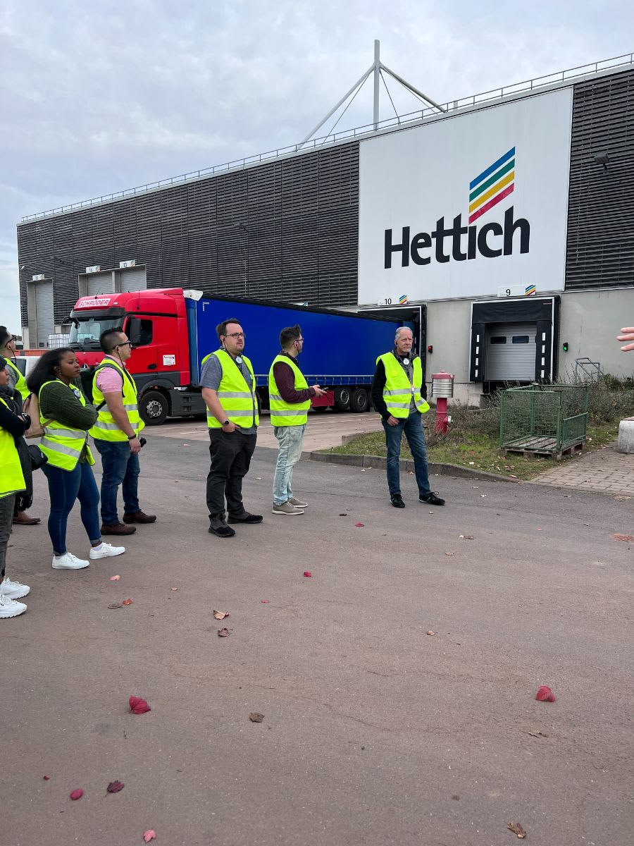 the 2022 eggersmann factory tour group outside hettich awaiting a tour of the furniture fittings factory