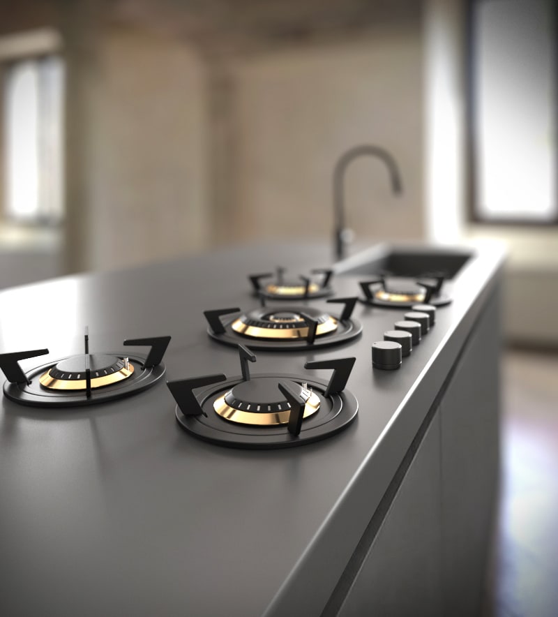 closeup of tulip cooking gas burners directly installed into the countertop material
