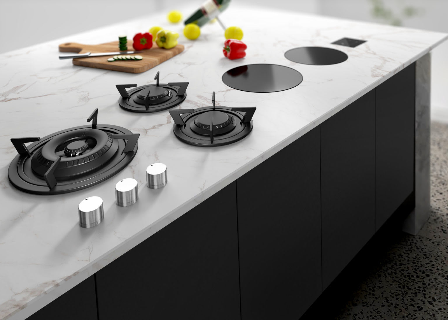 induction and gas burners installed into a stone countertop of an island