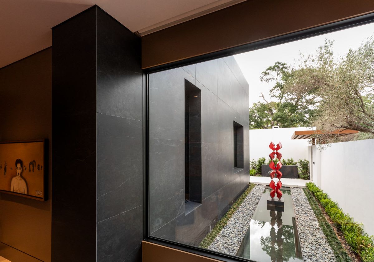 sculpture in a courtyard of a new construction in tanglewood