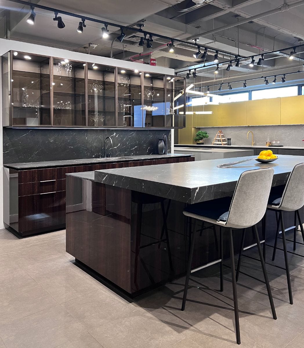 modern kitchen display featuring motion sliding counter for dining in the eggersmann new york-showroom