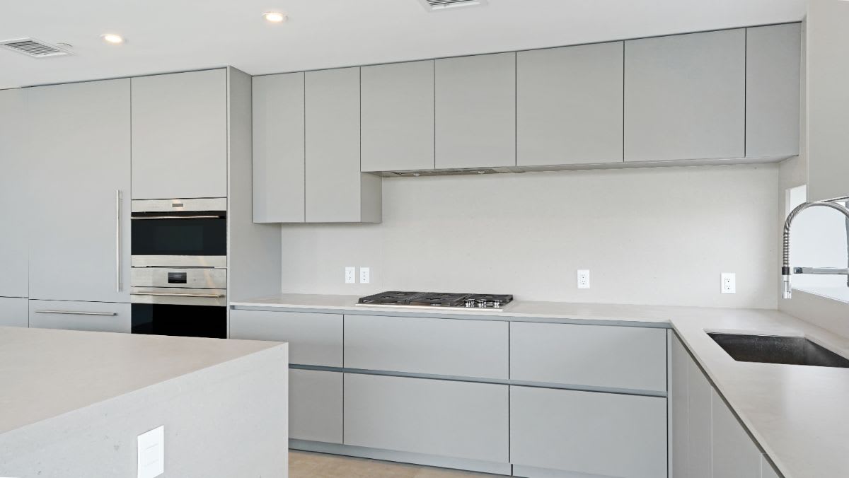all-gray kitchen designed by eggersmann for a one24 residences penthouse in fort lauderdale florida
