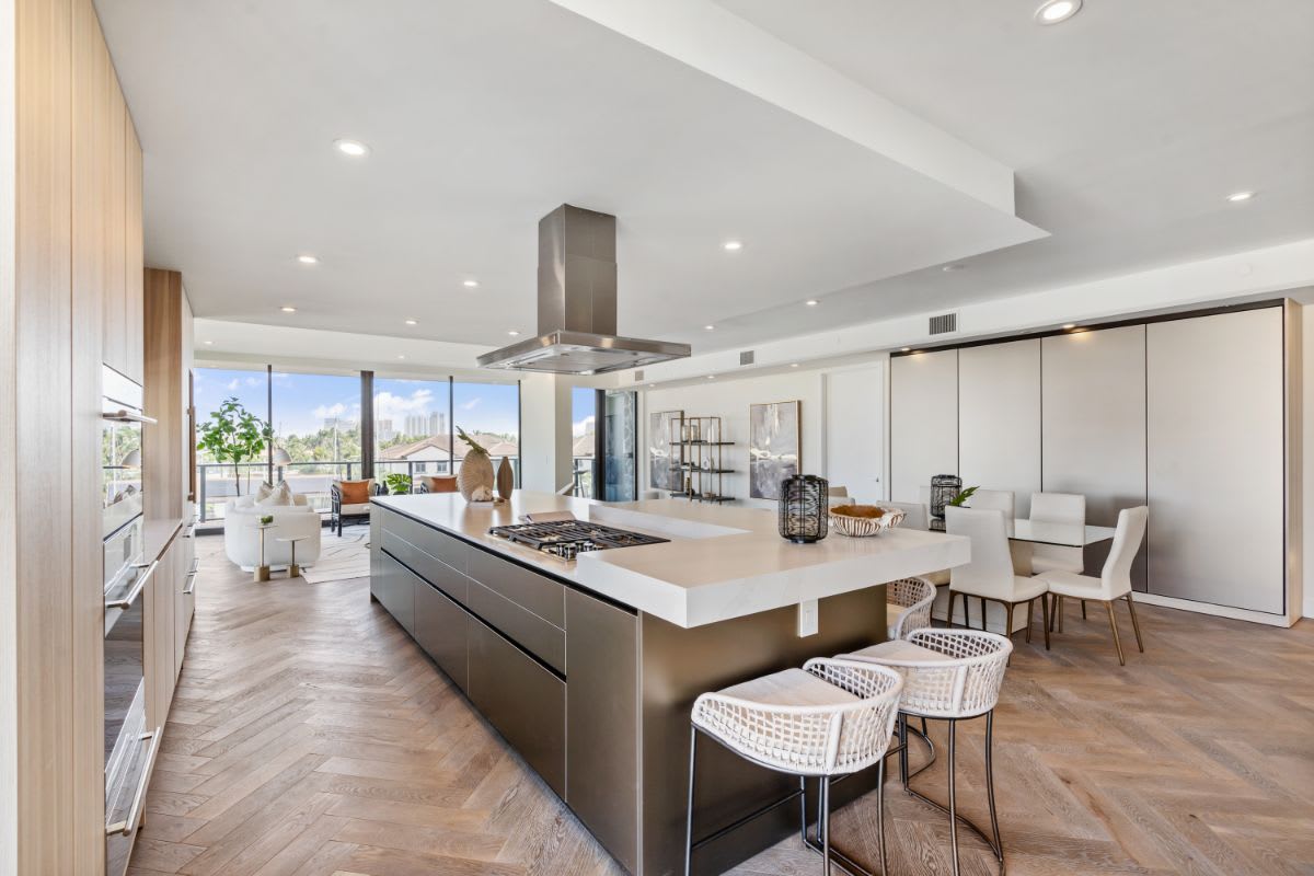 one24 residences penthouse kitchen island with barstools