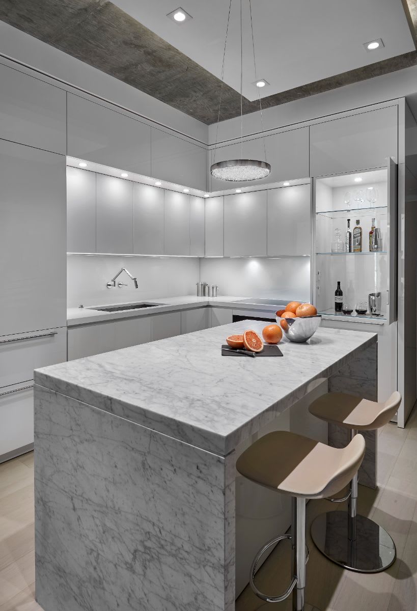 luxury dry bar in a gloss-gray kitchen designed by eggersmann