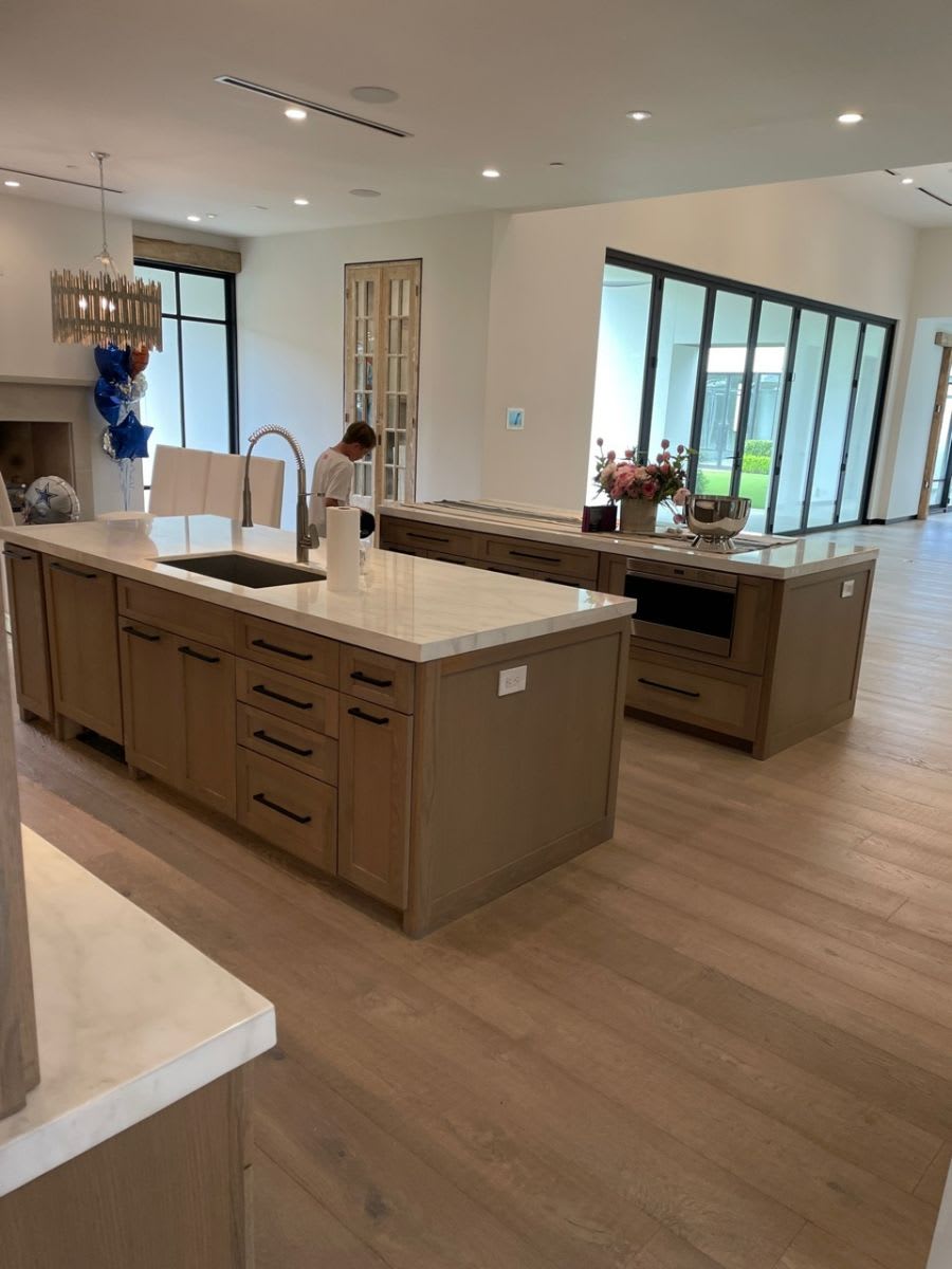before picture of preston hollow double island kitchen cabinetry