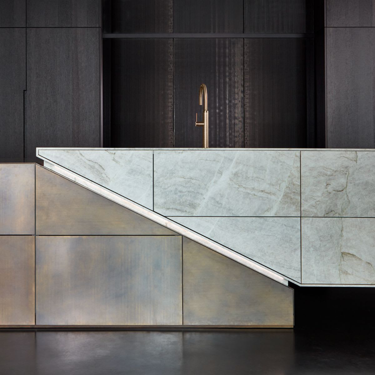 junction of stone end of the eggersmann skywalk metal and stone veneer kitchen island