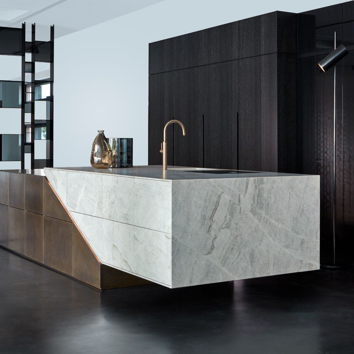closeup of stone end of the eggersmann skywalk metal and stone veneer kitchen island