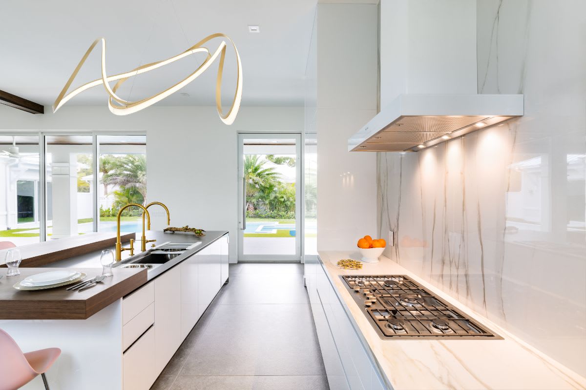 galley of a luxury white kitchen in jupiter fl