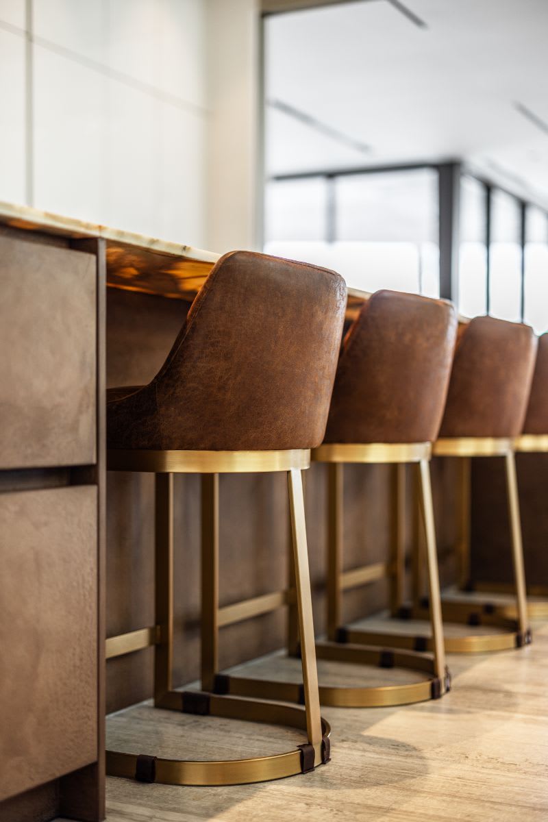 bar stools at the breakfast bar of a miami beach intracoastal luxury home