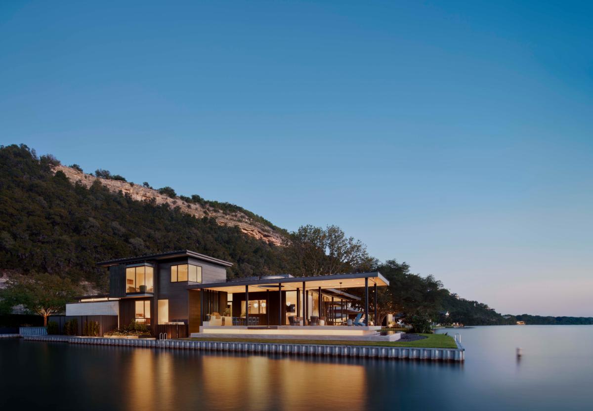 luxury red oak naeighborhood home appears to float on lake austin waterfront that won the luxe red Award for architecture