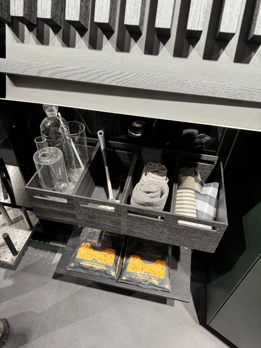 box cube caddies in a bar of the work's kitchen exhibited at eurocucina of the salone del mobile milan 2024