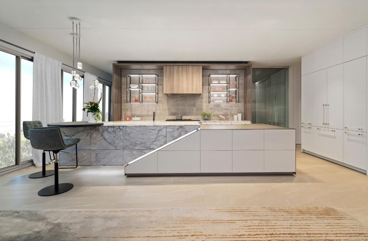display kitchen featuring gravity-defying SKYWALK kitchen island in the eggersmann laguna showroom