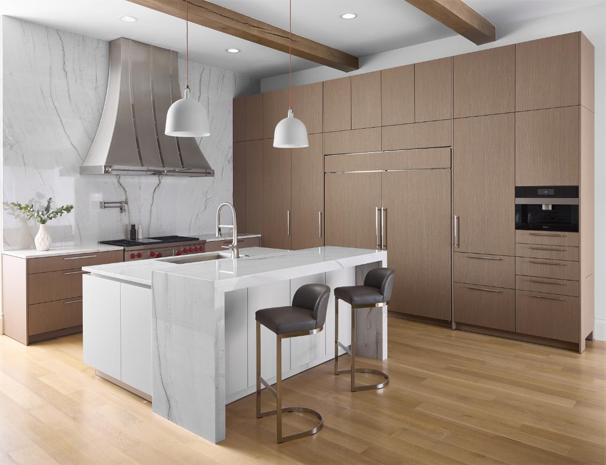 contrasting cabinetry used in the design of a contemporary luxury kitchen by eggersmann for a highland park home in the dallas metroplex