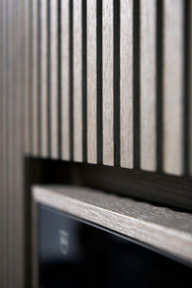 A closer look at Apartment Interiors Featuring Warm Textured Cabinetry