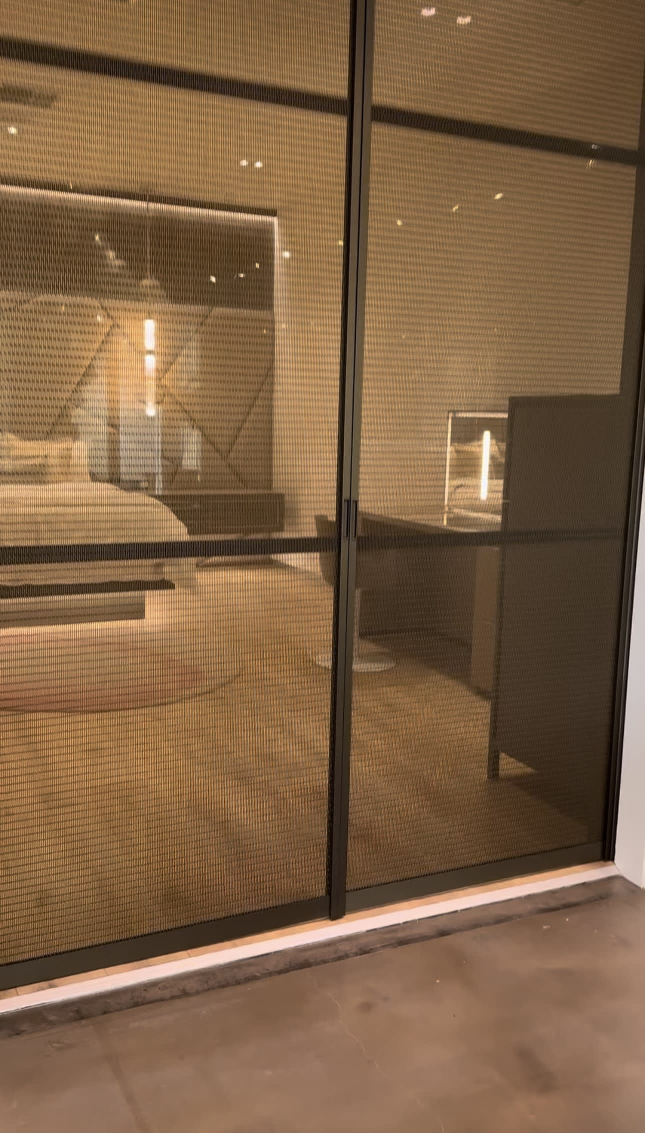 interlink glass cabinet fronts with embedded bronze chain