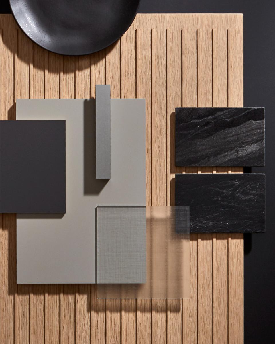 mood board of textured cabinetry finishes including osaka tambour veneer, glance glass in a parsol smoked finish, and portland linoleum in pebble
